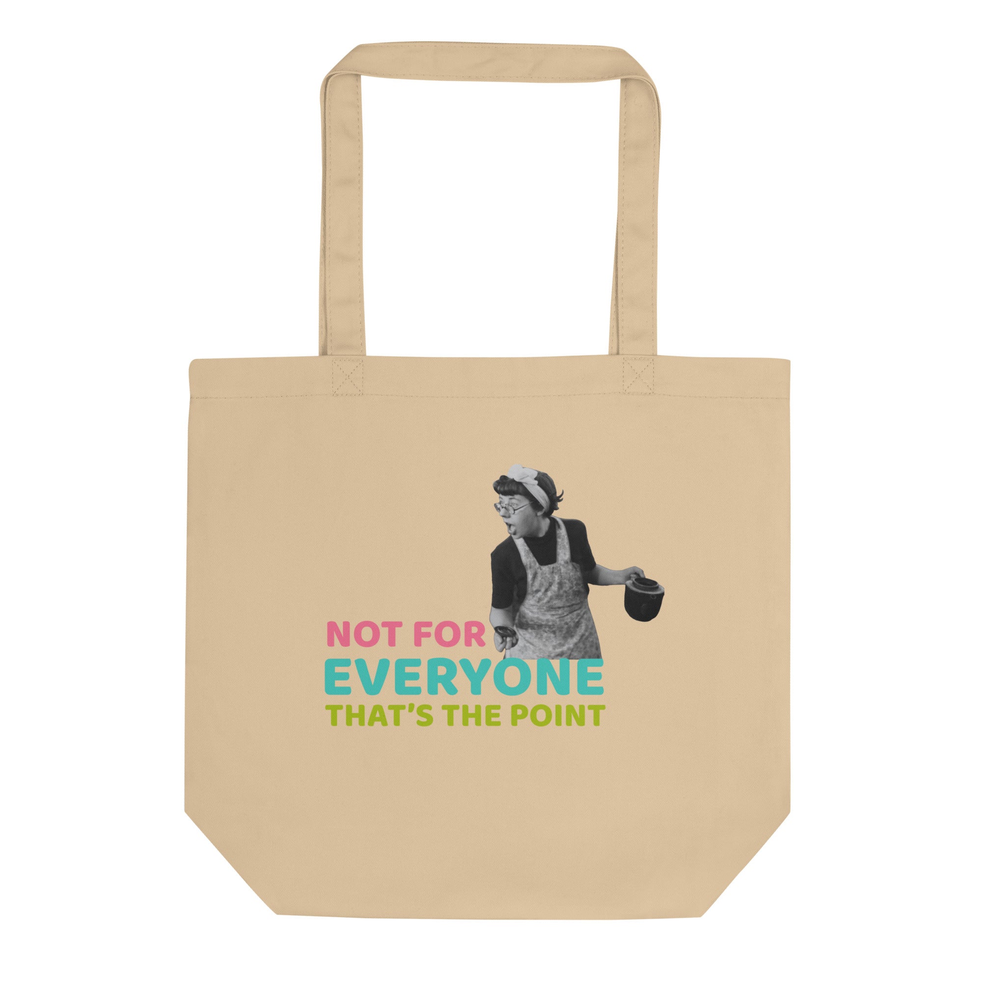 Beige eco tote bag with bold quote 'not for everyone that's the point' print in turquoise and pink, featuring a retro woman graphic, front view, by pepa de mango