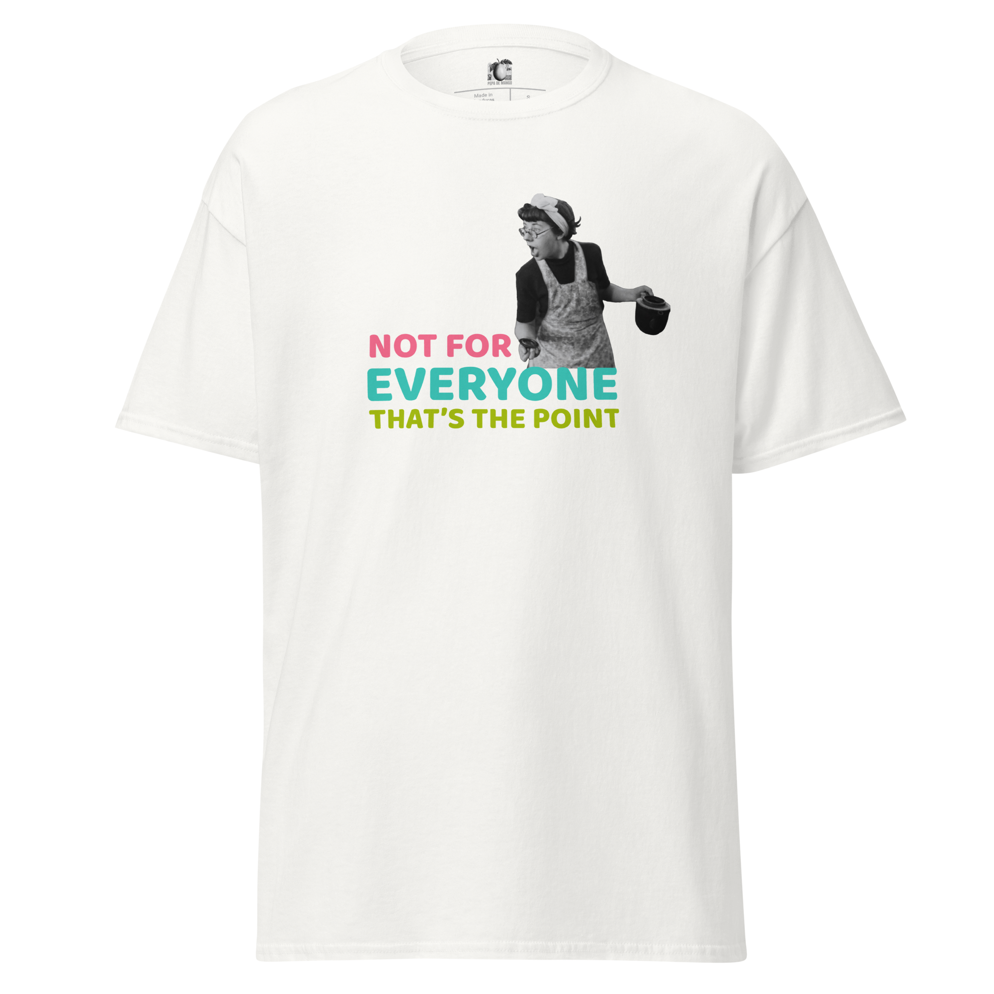 Front view of a white unisex statement t-shirt by Pepa de Mango. The shirt features a bold retro-style print of a vintage woman holding a frying pan, with the text "Not for everyone, that's the point" in pink, teal and lime green. Made from soft cotton with a relaxed fit.