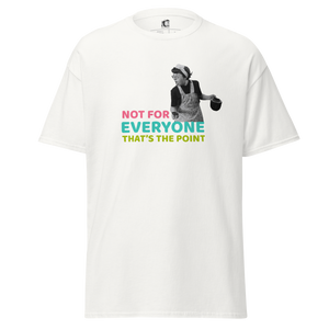 Front view of a white unisex statement t-shirt by Pepa de Mango. The shirt features a bold retro-style print of a vintage woman holding a frying pan, with the text "Not for everyone, that's the point" in pink, teal and lime green. Made from soft cotton with a relaxed fit.