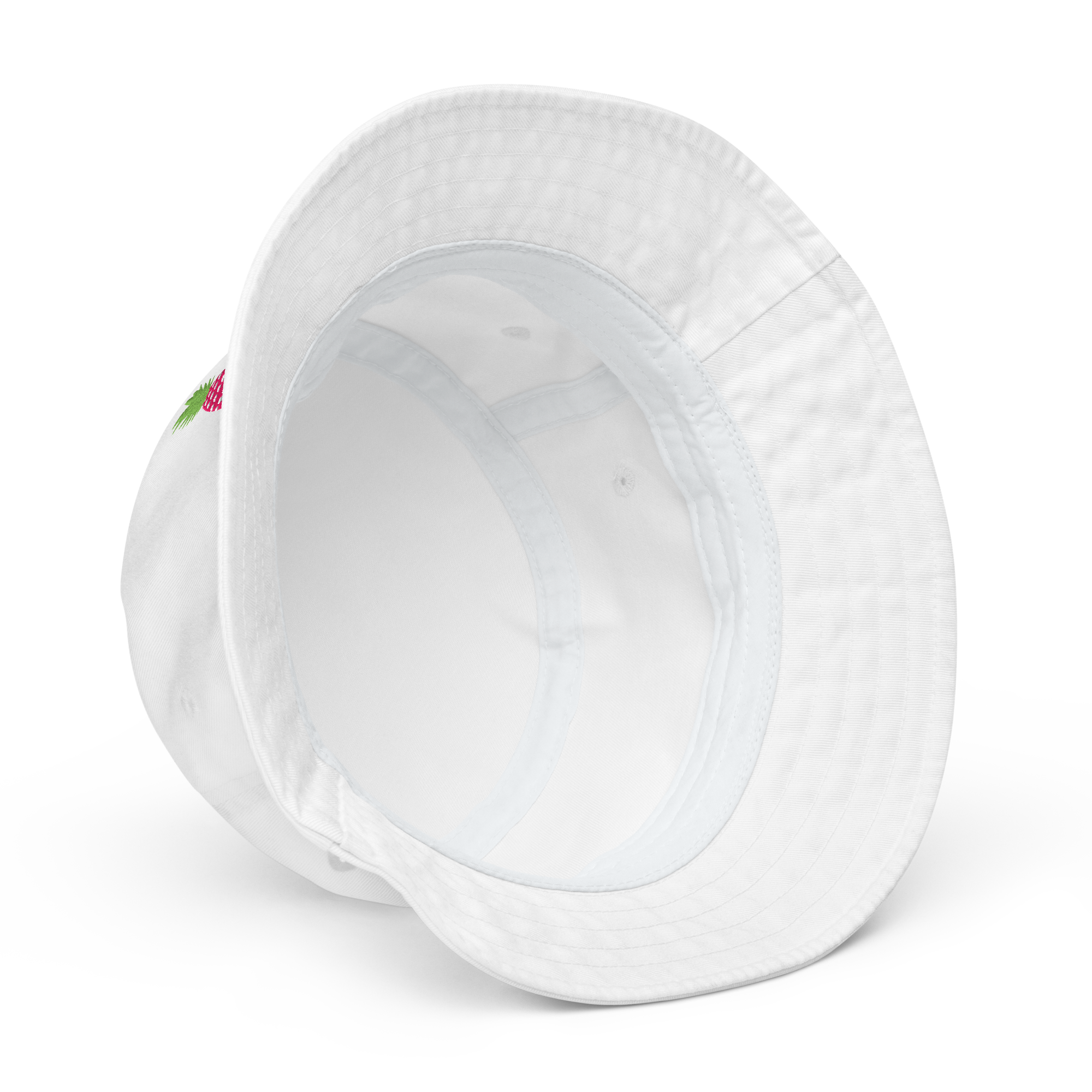 Inside view of white organic cotton bucket hat with pink pineapple embroidery – Pepa de Mango