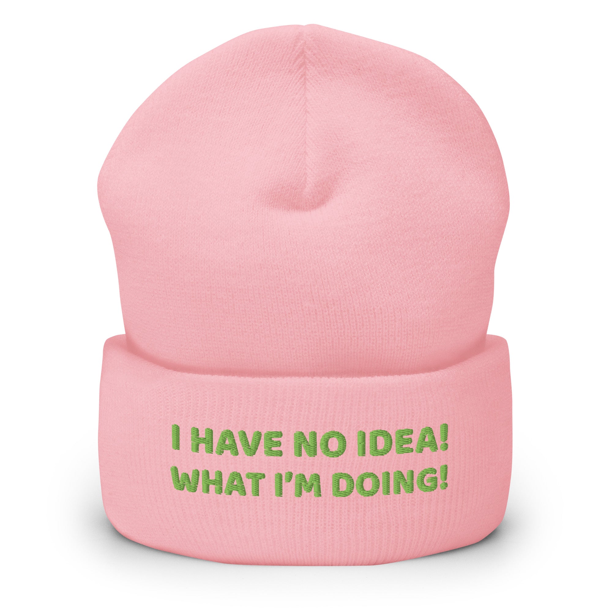 Pink beanie with a phrase 'I have no idea, what i'm doing' embroidered in green. 