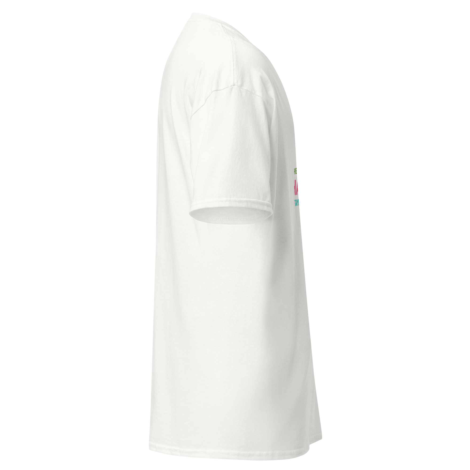 Left side view of a white unisex short sleeve statement t-shirt by Pepa de Mango, made from soft cotton with a relaxed fit and crew neckline. The edge of the colorful front print is visible, showing part of a lime, red flower, and pink text that wraps around from the front. Displayed against a transparent background.