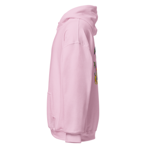 Light pink hoodie, left side view, surreal tropical design with palm leaves, parrot, citrus slice, and abstract yellow face artwork partially visible, design made by pepa de mango