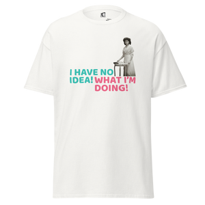 White unisex t-shirt with a vintage woman standing by a table in black and white, and colorful text saying "I have no idea! What I'm doing!" by pepa de mango.